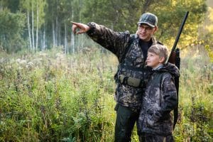 Father,Teaching His Son About Gun Safety and Proper Use